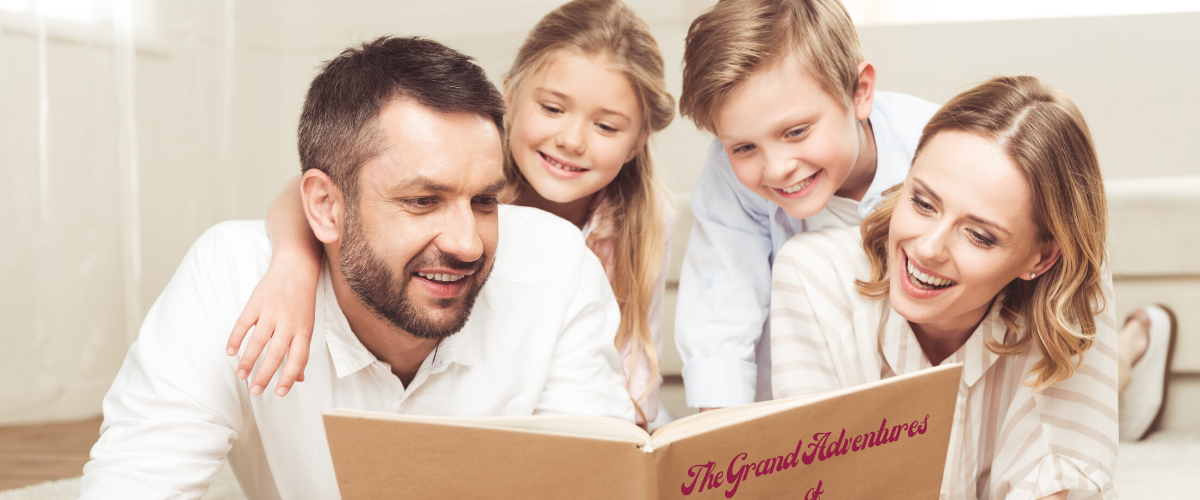 Family Reading a book together